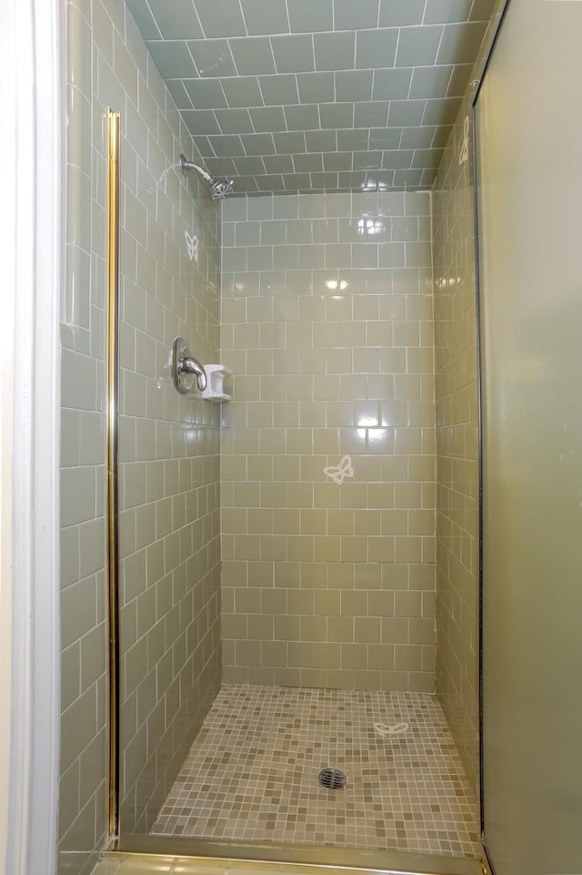 bathroom featuring an enclosed shower