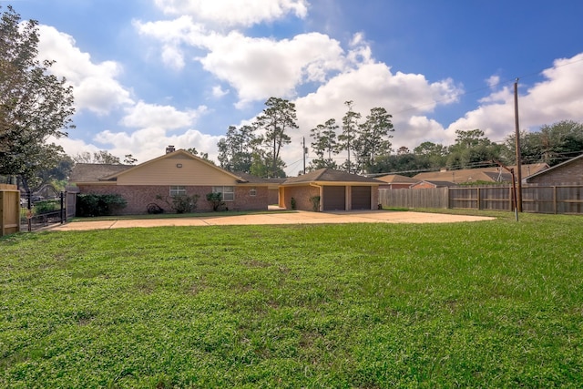 view of yard with a garage