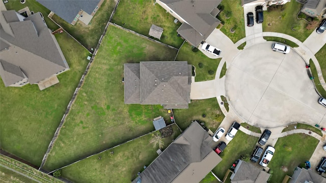 birds eye view of property with a residential view