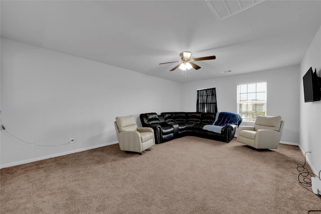 living room with carpet floors and ceiling fan