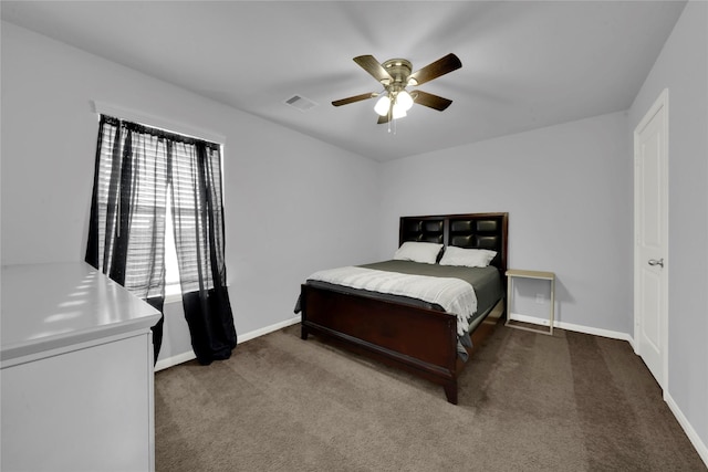 bedroom with carpet, visible vents, ceiling fan, and baseboards