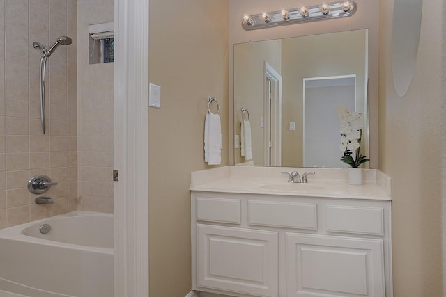 full bathroom with bathing tub / shower combination and vanity