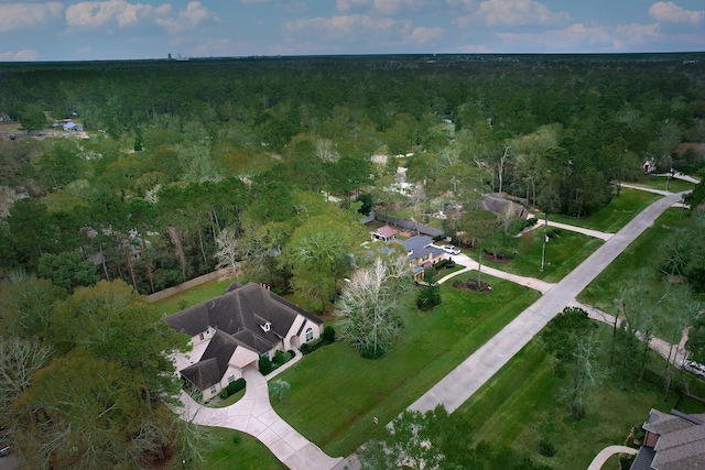 drone / aerial view with a forest view