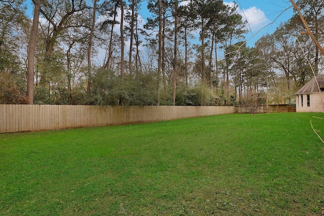 view of yard with fence