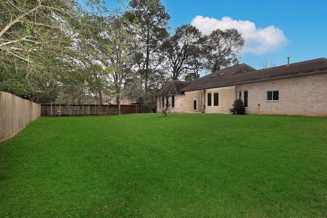 view of yard featuring a fenced backyard