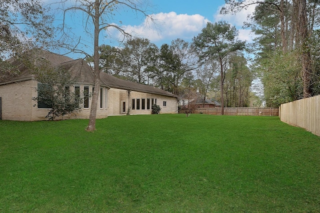 view of yard with fence