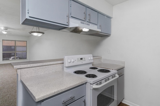 kitchen with white range with electric cooktop, ceiling fan, gray cabinetry, and range hood