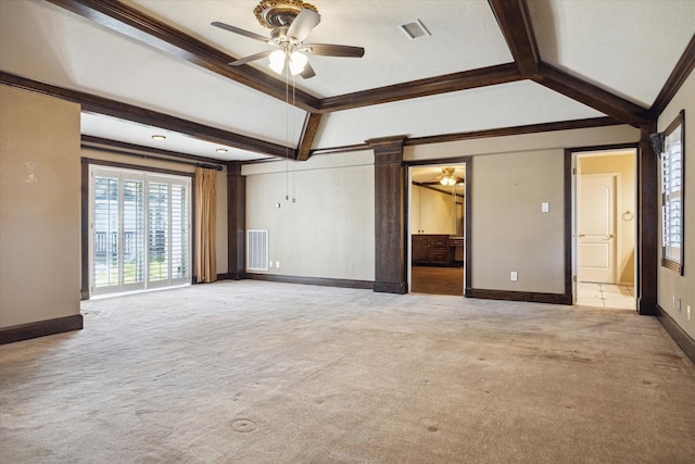 carpeted spare room featuring crown molding, ceiling fan, and lofted ceiling with beams