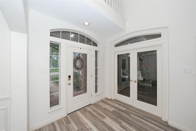 entrance foyer featuring wood-type flooring and french doors