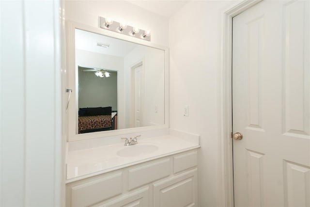 bathroom featuring vanity and ceiling fan