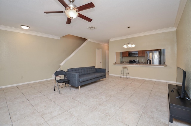 living room featuring ceiling fan with notable chandelier and ornamental molding