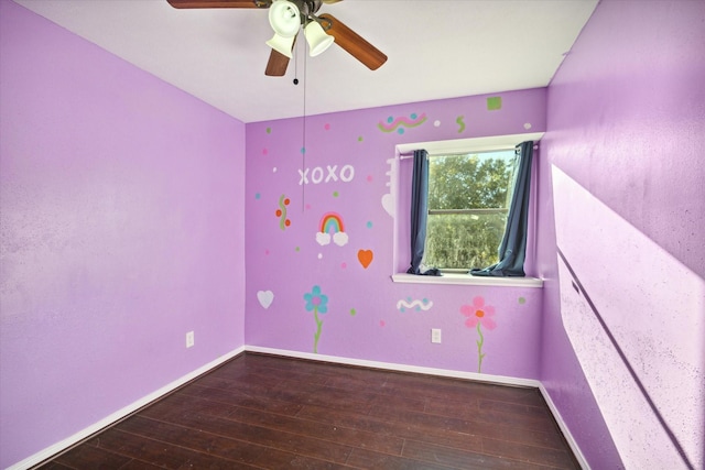 unfurnished room with hardwood / wood-style flooring and ceiling fan