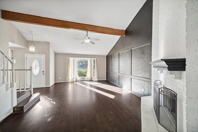 unfurnished living room with high vaulted ceiling, a brick fireplace, ceiling fan, dark hardwood / wood-style floors, and beam ceiling