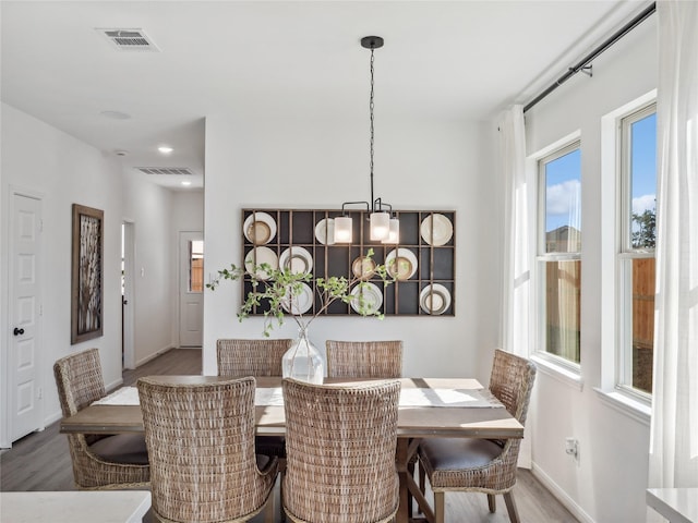 dining area featuring hardwood / wood-style flooring