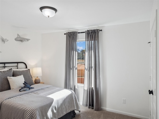 bedroom featuring carpet