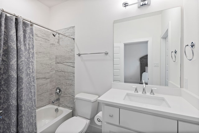 full bathroom with shower / bath combination with curtain, vanity, and toilet