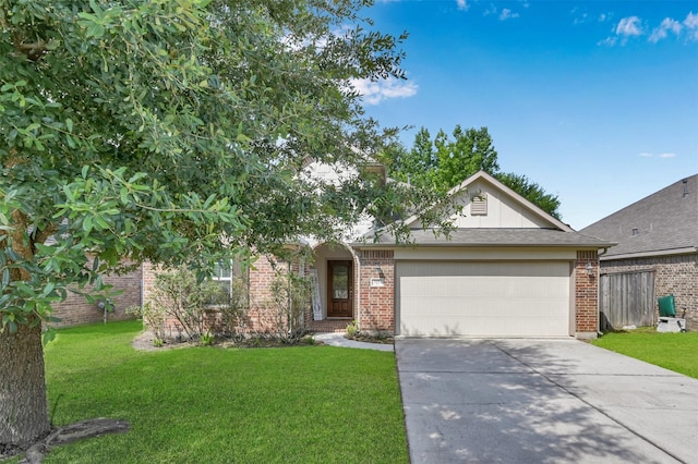 single story home with a garage and a front lawn