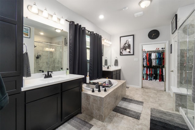 bathroom featuring vanity and plus walk in shower