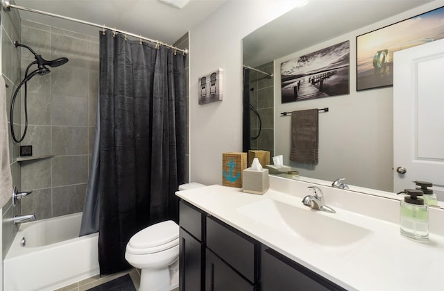 full bathroom with vanity, shower / bath combo, and toilet