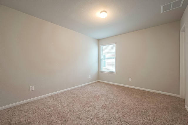 unfurnished room with carpet