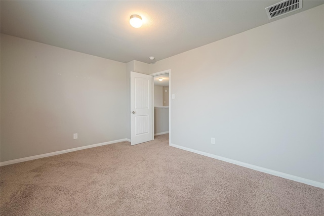 empty room featuring carpet