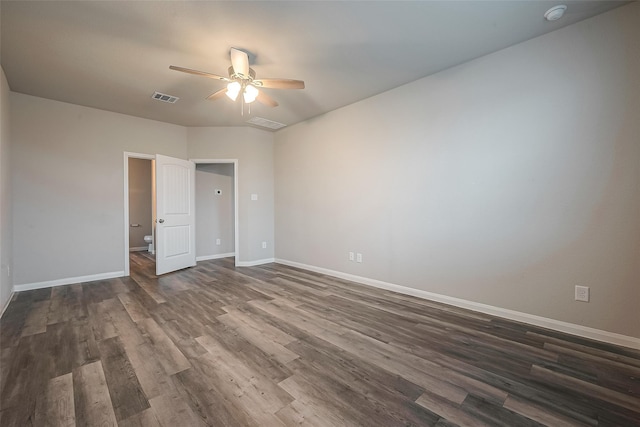 unfurnished bedroom featuring ceiling fan and dark hardwood / wood-style floors