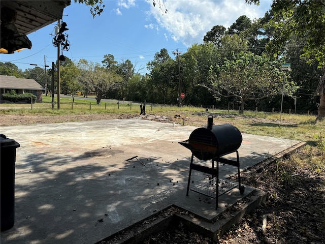 view of patio featuring a grill