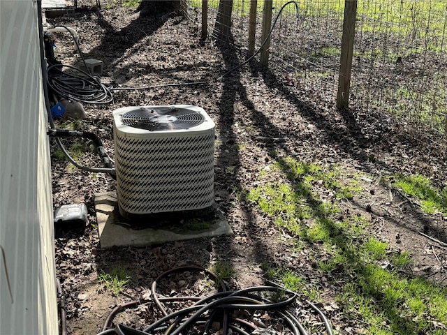 411 Lawrence Rd, Trinity, TX 75862 - exterior view of a central air condition unit