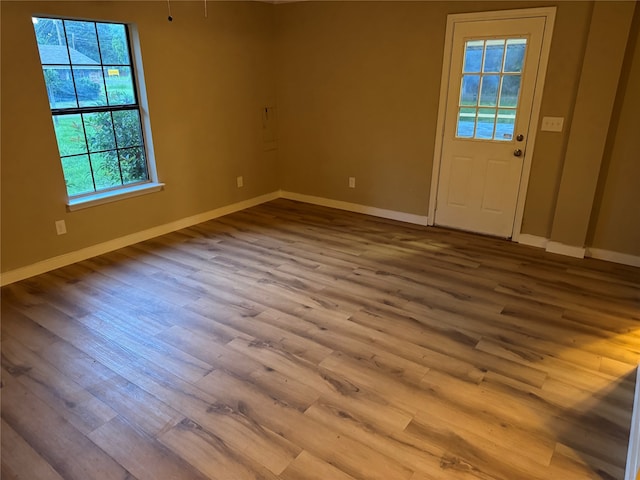 411 Lawrence Rd, Trinity, TX 75862 - unfurnished room featuring wood finished floors