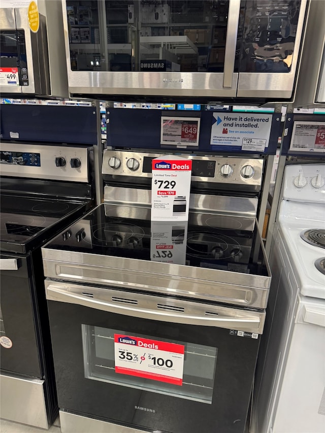 411 Lawrence Rd, Trinity, TX 75862 - kitchen with stainless steel range with electric cooktop and stove