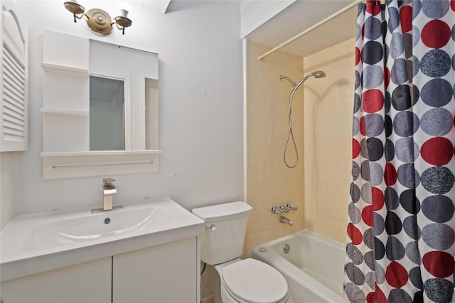 full bathroom with shower / bath combo, vanity, and toilet