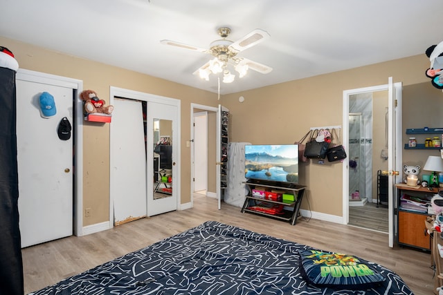 game room featuring hardwood / wood-style flooring and ceiling fan