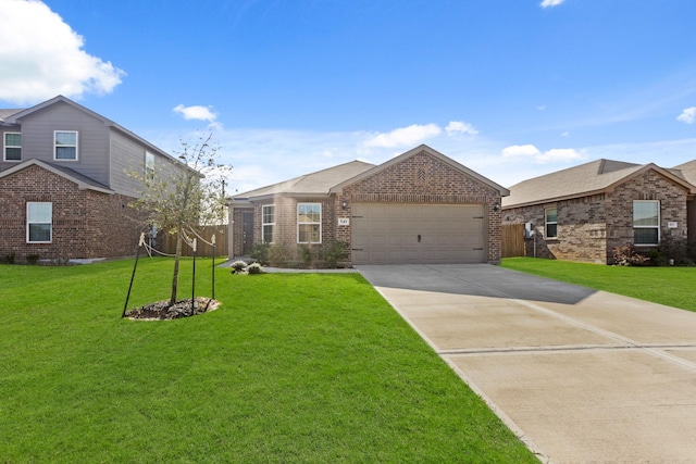 view of front facade with a front yard and a garage