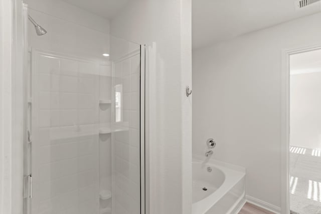 bathroom with plus walk in shower