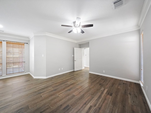 unfurnished room with dark hardwood / wood-style flooring, ceiling fan, and ornamental molding