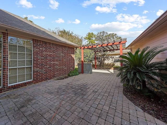 view of patio / terrace featuring a pergola