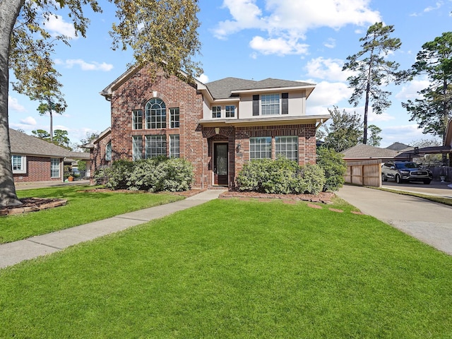 view of front of home featuring a front yard