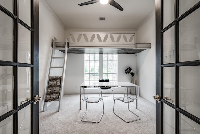 office featuring carpet flooring, french doors, ceiling fan, and ornamental molding