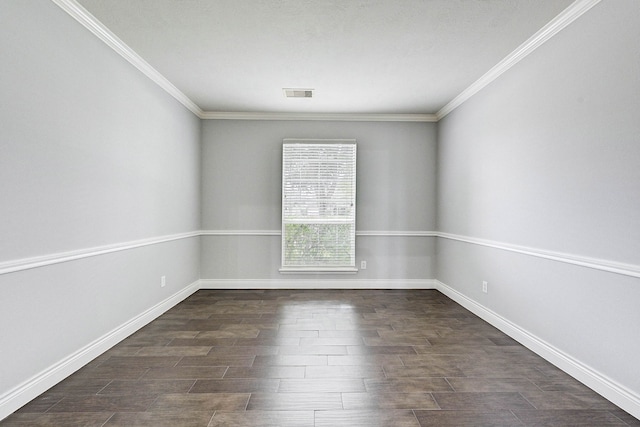 unfurnished room featuring dark hardwood / wood-style flooring and ornamental molding