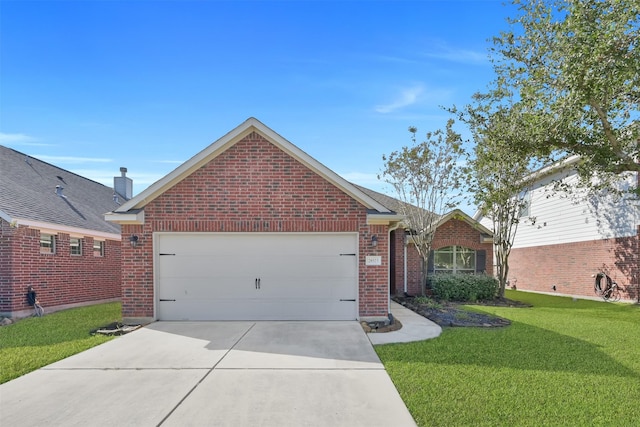 ranch-style house featuring a front lawn and a garage