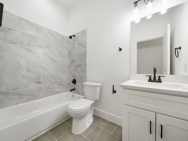 full bathroom featuring tile patterned floors, tiled shower / bath combo, toilet, and vanity