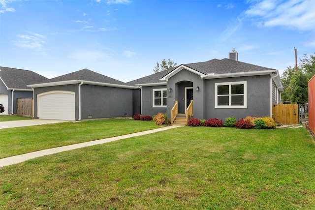 ranch-style house with a front lawn and a garage