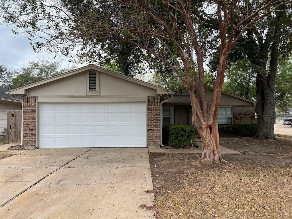 ranch-style house featuring a garage