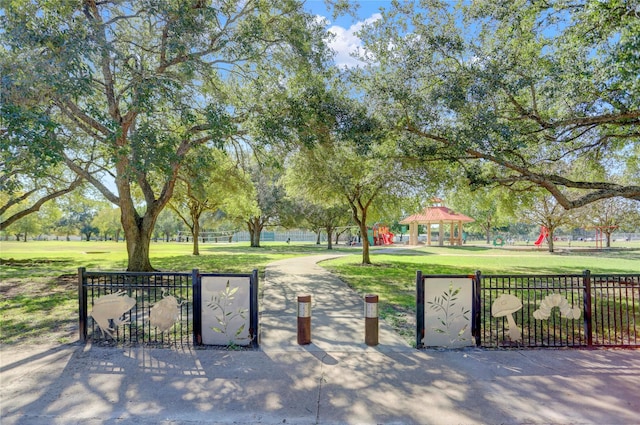 view of home's community with a gazebo and a lawn