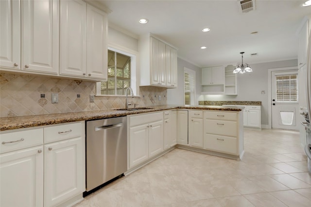 kitchen with white cabinetry, stainless steel dishwasher, and sink