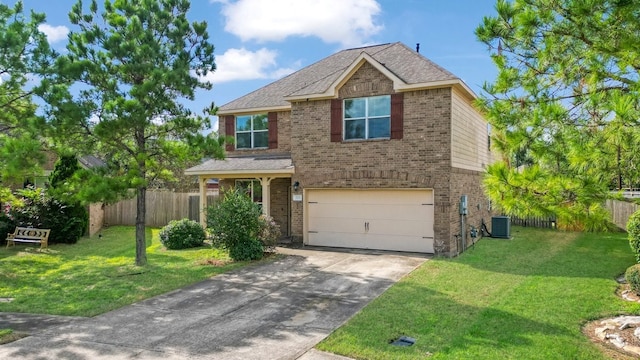 view of front of house with cooling unit, a garage, and a front yard