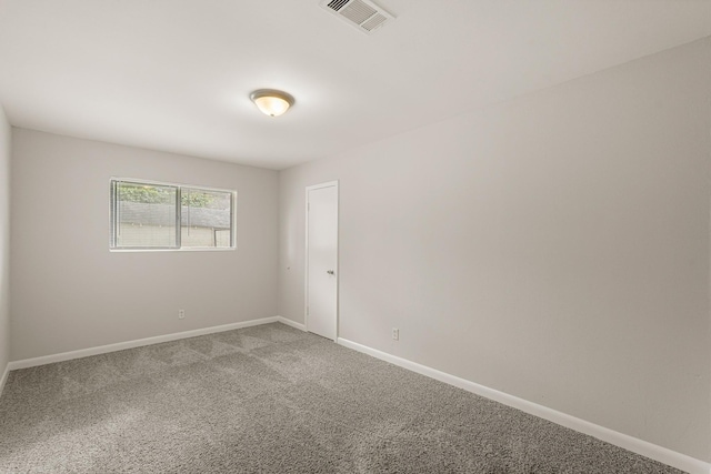 view of carpeted spare room