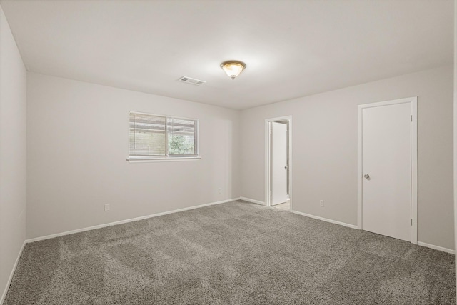 empty room featuring carpet