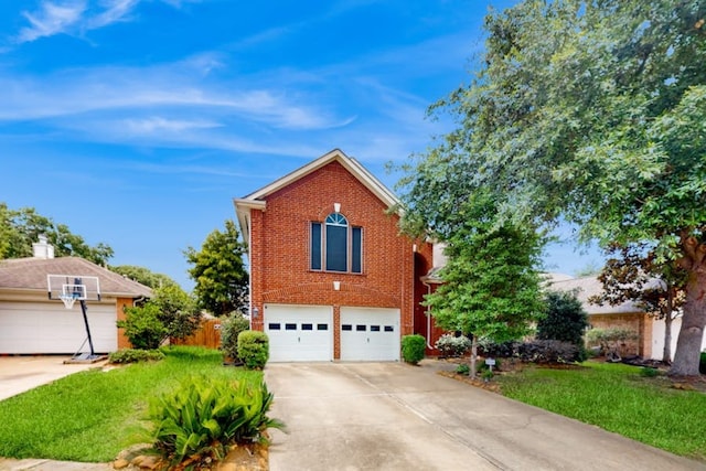 front of property with a front lawn and a garage