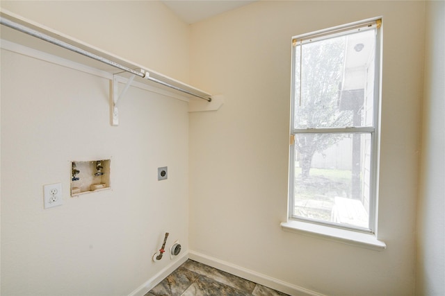 washroom featuring gas dryer hookup, hookup for a washing machine, and hookup for an electric dryer